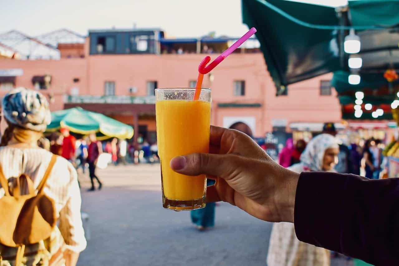 Have an orange juice in Djemma El Fna! Your private driver in Morocco will recommend the best restaurants to you.