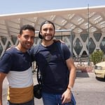 Sir Driver Tours client with Salmane at Marrakech Menara Airport in Morocco